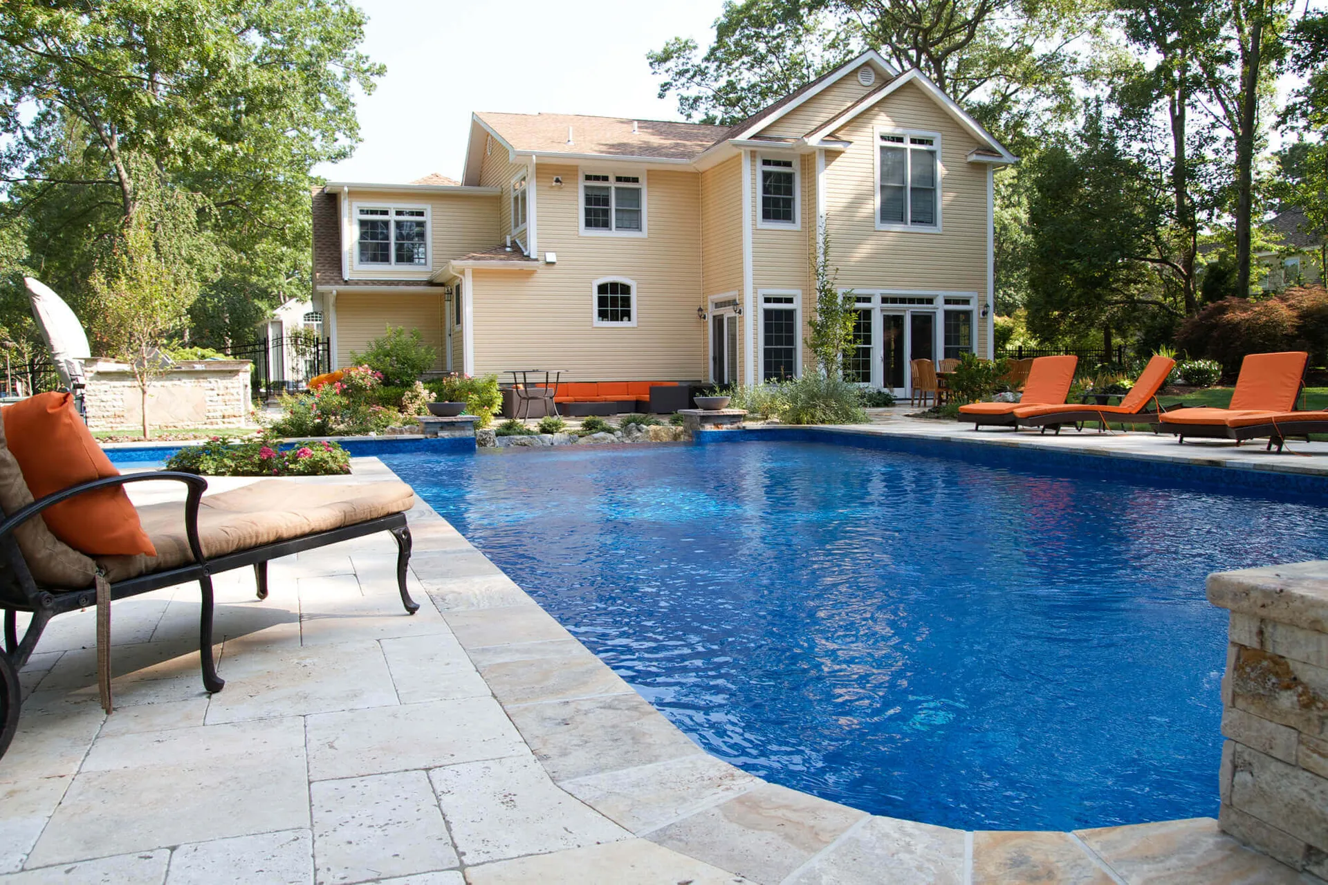 Beautiful pool backyard with professional landscaping